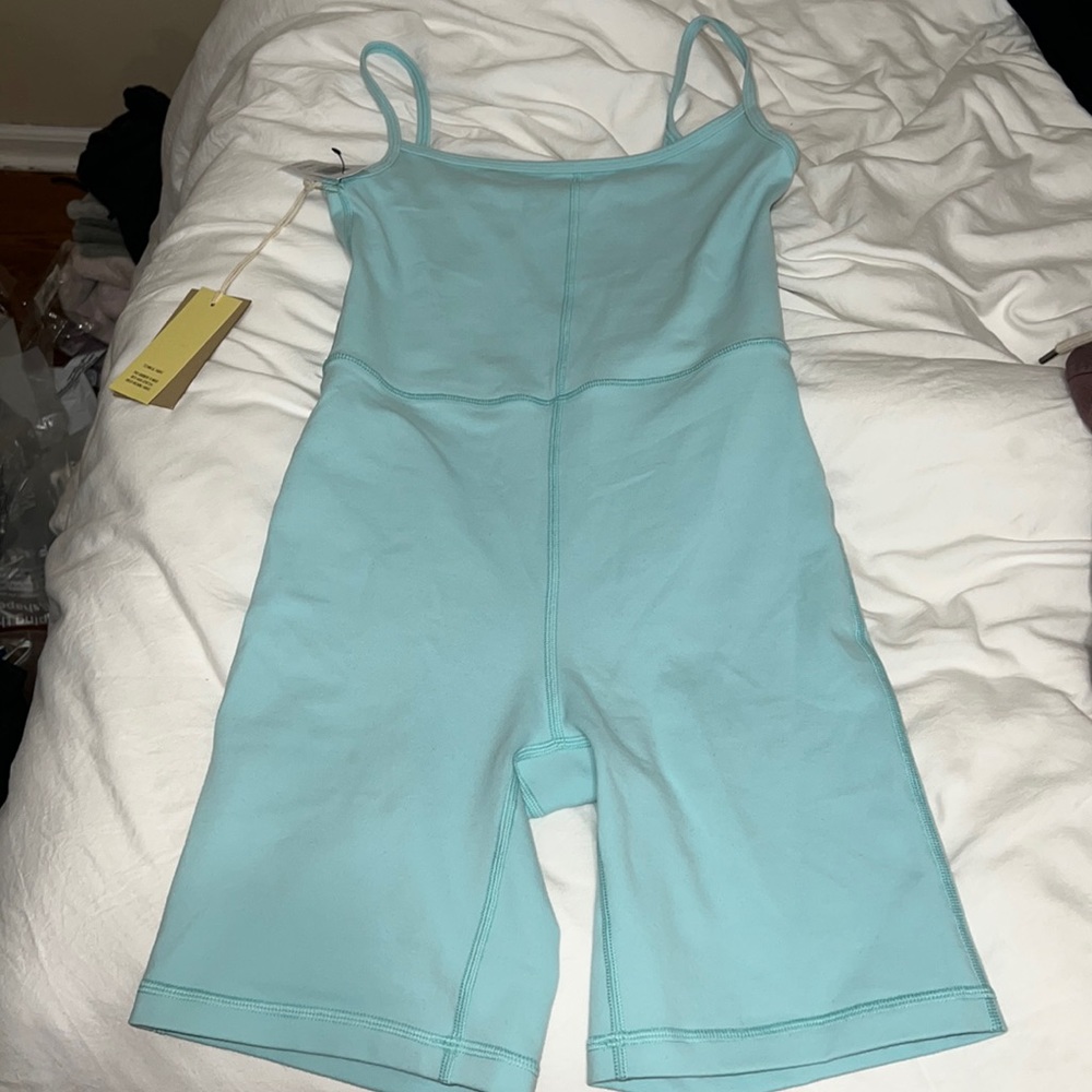 Brand New Aritzia Adriatic Blue Divinity 7” Romper.Bought for trip & never wore!